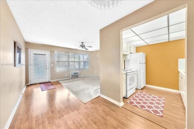 This charming 1-bedroom, 1-bathroom unit is filled with natural on Flamingo Lakes Country Club in Florida - for sale on GolfHomes.com, golf home, golf lot