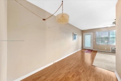 This charming 1-bedroom, 1-bathroom unit is filled with natural on Flamingo Lakes Country Club in Florida - for sale on GolfHomes.com, golf home, golf lot