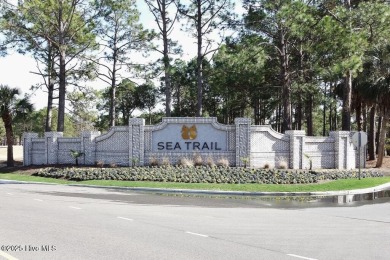 This expansive residence boasts 3 bedrooms, 3.5 bathrooms, and on Oyster Bay Golf Links in North Carolina - for sale on GolfHomes.com, golf home, golf lot