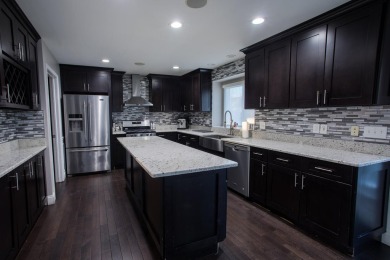 Welcome to this beautifully updated single-family home in the on Stonebridge Golf Club in Michigan - for sale on GolfHomes.com, golf home, golf lot