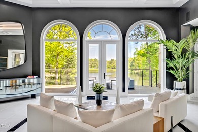 Lake Views! As the sun rises over the serene lake, it gently on Governors Club in North Carolina - for sale on GolfHomes.com, golf home, golf lot