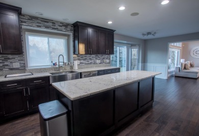Welcome to this beautifully updated single-family home in the on Stonebridge Golf Club in Michigan - for sale on GolfHomes.com, golf home, golf lot