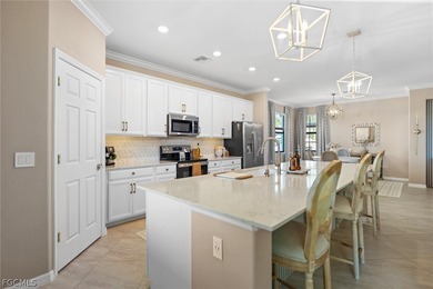 This beautiful second-floor, western-exposure condo offers over on Gateway Golf and Country Club in Florida - for sale on GolfHomes.com, golf home, golf lot