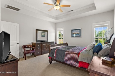 The all-brick former model home in the Regency Lakes section of on Members Club At St. James Plantation in North Carolina - for sale on GolfHomes.com, golf home, golf lot