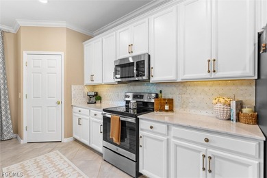 This beautiful second-floor, western-exposure condo offers over on Gateway Golf and Country Club in Florida - for sale on GolfHomes.com, golf home, golf lot