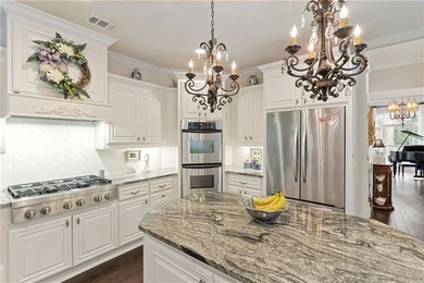 THIS IS A BEAUTIFULLY UPDATED, LUXURIOUS, CUSTOM BUILT, UPSCALE on Oak Grove Island Golf and Country Club in Georgia - for sale on GolfHomes.com, golf home, golf lot