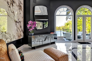 Lake Views! As the sun rises over the serene lake, it gently on Governors Club in North Carolina - for sale on GolfHomes.com, golf home, golf lot