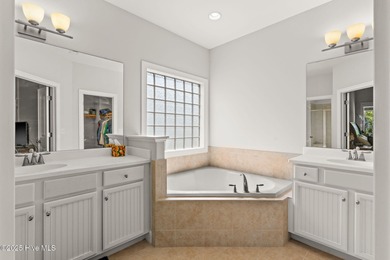 The all-brick former model home in the Regency Lakes section of on Members Club At St. James Plantation in North Carolina - for sale on GolfHomes.com, golf home, golf lot