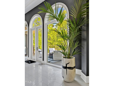 Lake Views! As the sun rises over the serene lake, it gently on Governors Club in North Carolina - for sale on GolfHomes.com, golf home, golf lot