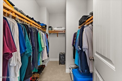 The all-brick former model home in the Regency Lakes section of on Members Club At St. James Plantation in North Carolina - for sale on GolfHomes.com, golf home, golf lot