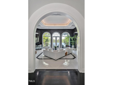 Lake Views! As the sun rises over the serene lake, it gently on Governors Club in North Carolina - for sale on GolfHomes.com, golf home, golf lot