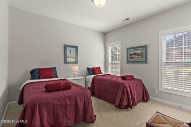 The all-brick former model home in the Regency Lakes section of on Members Club At St. James Plantation in North Carolina - for sale on GolfHomes.com, golf home, golf lot