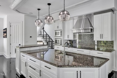 Lake Views! As the sun rises over the serene lake, it gently on Governors Club in North Carolina - for sale on GolfHomes.com, golf home, golf lot