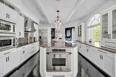 Lake Views! As the sun rises over the serene lake, it gently on Governors Club in North Carolina - for sale on GolfHomes.com, golf home, golf lot