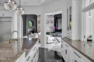 Lake Views! As the sun rises over the serene lake, it gently on Governors Club in North Carolina - for sale on GolfHomes.com, golf home, golf lot