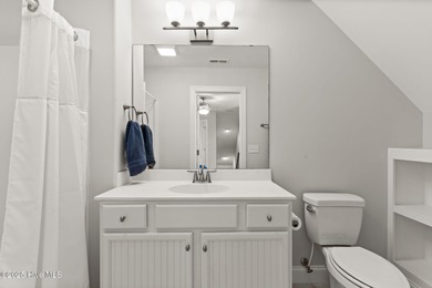 The all-brick former model home in the Regency Lakes section of on Members Club At St. James Plantation in North Carolina - for sale on GolfHomes.com, golf home, golf lot