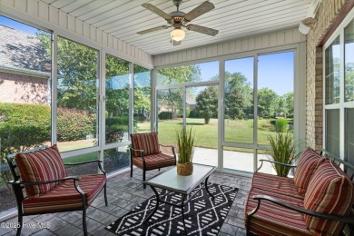 The all-brick former model home in the Regency Lakes section of on Members Club At St. James Plantation in North Carolina - for sale on GolfHomes.com, golf home, golf lot