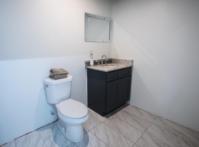 Welcome to this beautifully updated single-family home in the on Stonebridge Golf Club in Michigan - for sale on GolfHomes.com, golf home, golf lot