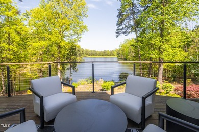 Lake Views! As the sun rises over the serene lake, it gently on Governors Club in North Carolina - for sale on GolfHomes.com, golf home, golf lot