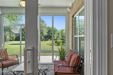 The all-brick former model home in the Regency Lakes section of on Members Club At St. James Plantation in North Carolina - for sale on GolfHomes.com, golf home, golf lot