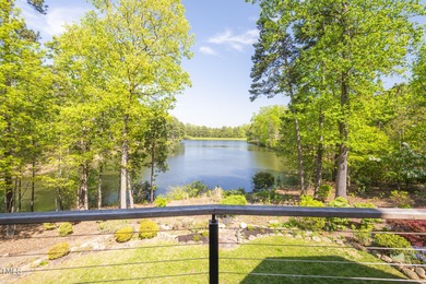 Lake Views! As the sun rises over the serene lake, it gently on Governors Club in North Carolina - for sale on GolfHomes.com, golf home, golf lot