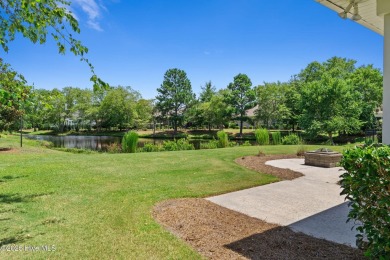 The all-brick former model home in the Regency Lakes section of on Members Club At St. James Plantation in North Carolina - for sale on GolfHomes.com, golf home, golf lot