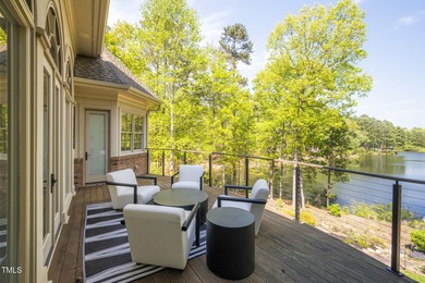 Lake Views! As the sun rises over the serene lake, it gently on Governors Club in North Carolina - for sale on GolfHomes.com, golf home, golf lot