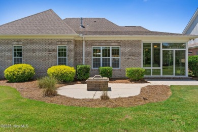 The all-brick former model home in the Regency Lakes section of on Members Club At St. James Plantation in North Carolina - for sale on GolfHomes.com, golf home, golf lot