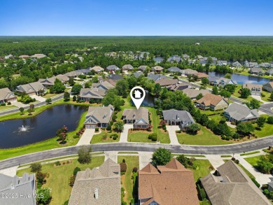 The all-brick former model home in the Regency Lakes section of on Members Club At St. James Plantation in North Carolina - for sale on GolfHomes.com, golf home, golf lot