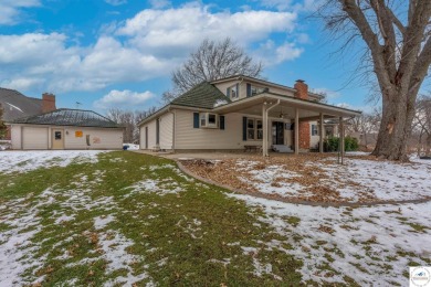 This exquisite 1.5-story, 3-bedroom, 3.5 bath home offers luxury on Sedalia Country Club in Missouri - for sale on GolfHomes.com, golf home, golf lot