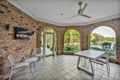 Lake Views! As the sun rises over the serene lake, it gently on Governors Club in North Carolina - for sale on GolfHomes.com, golf home, golf lot