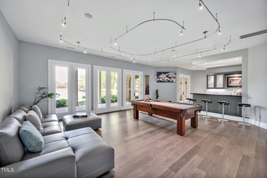 Lake Views! As the sun rises over the serene lake, it gently on Governors Club in North Carolina - for sale on GolfHomes.com, golf home, golf lot