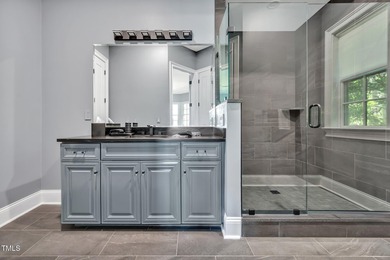 Lake Views! As the sun rises over the serene lake, it gently on Governors Club in North Carolina - for sale on GolfHomes.com, golf home, golf lot