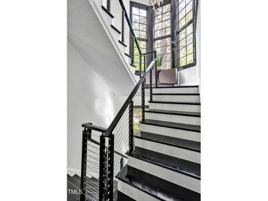 Lake Views! As the sun rises over the serene lake, it gently on Governors Club in North Carolina - for sale on GolfHomes.com, golf home, golf lot