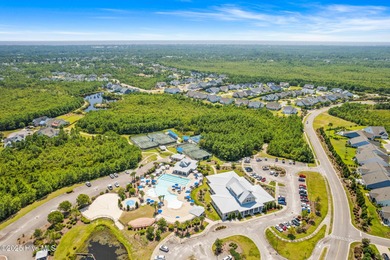 The all-brick former model home in the Regency Lakes section of on Members Club At St. James Plantation in North Carolina - for sale on GolfHomes.com, golf home, golf lot