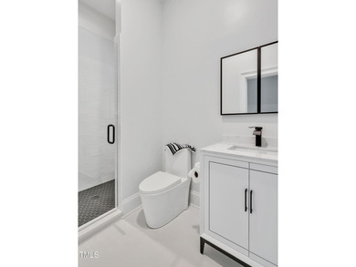 Lake Views! As the sun rises over the serene lake, it gently on Governors Club in North Carolina - for sale on GolfHomes.com, golf home, golf lot