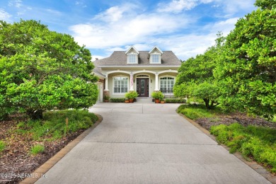 This elegant David Weekley home offers panoramic water views on The Palencia Club in Florida - for sale on GolfHomes.com, golf home, golf lot