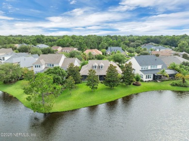 This elegant David Weekley home offers panoramic water views on The Palencia Club in Florida - for sale on GolfHomes.com, golf home, golf lot