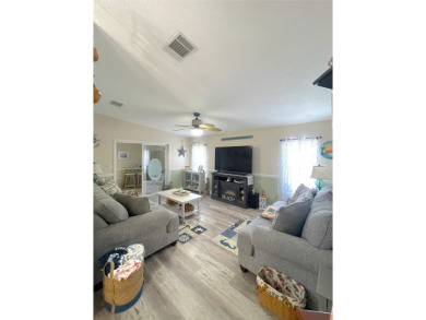 Welcome to the gorgeous community of LAKE FAIRWAYS! This vibrant on Lake Fairways Country Club in Florida - for sale on GolfHomes.com, golf home, golf lot