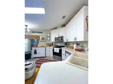 Welcome to the gorgeous community of LAKE FAIRWAYS! This vibrant on Lake Fairways Country Club in Florida - for sale on GolfHomes.com, golf home, golf lot