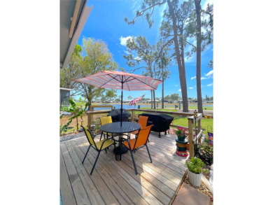 Welcome to the gorgeous community of LAKE FAIRWAYS! This vibrant on Lake Fairways Country Club in Florida - for sale on GolfHomes.com, golf home, golf lot