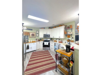 Welcome to the gorgeous community of LAKE FAIRWAYS! This vibrant on Lake Fairways Country Club in Florida - for sale on GolfHomes.com, golf home, golf lot