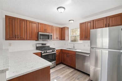 Welcome to your beautifully renovated home in the Village of on Glenview Championship Golf and Country Club in Florida - for sale on GolfHomes.com, golf home, golf lot