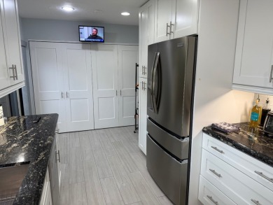 Rarely available 1,856 Sq Ft corner villa in the prestigious 55+ on Boca Lago Golf and Country Club in Florida - for sale on GolfHomes.com, golf home, golf lot