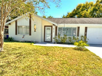Discover move-in-ready convenience in this charming 2-bedroom on Beacon Woods Golf Club in Florida - for sale on GolfHomes.com, golf home, golf lot