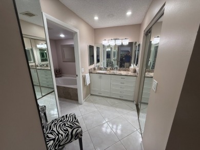 Rarely available 1,856 Sq Ft corner villa in the prestigious 55+ on Boca Lago Golf and Country Club in Florida - for sale on GolfHomes.com, golf home, golf lot
