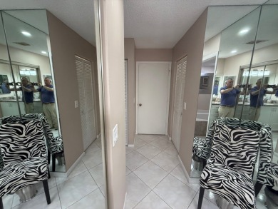 Rarely available 1,856 Sq Ft corner villa in the prestigious 55+ on Boca Lago Golf and Country Club in Florida - for sale on GolfHomes.com, golf home, golf lot