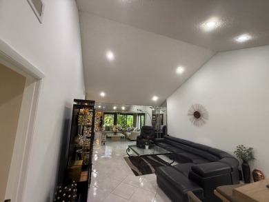 Rarely available 1,856 Sq Ft corner villa in the prestigious 55+ on Boca Lago Golf and Country Club in Florida - for sale on GolfHomes.com, golf home, golf lot