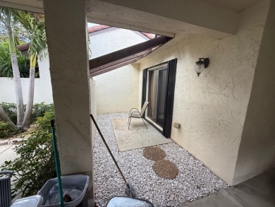 Rarely available 1,856 Sq Ft corner villa in the prestigious 55+ on Boca Lago Golf and Country Club in Florida - for sale on GolfHomes.com, golf home, golf lot