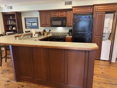 1st Floor exterior villa is privately located on #18th tee box on The Plantation Course At Edisto in South Carolina - for sale on GolfHomes.com, golf home, golf lot